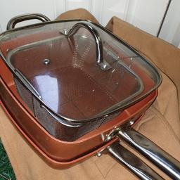 two copper pans
new never been used