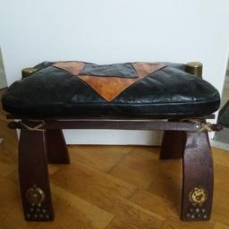 Used in good condition. 
Sturdy. There is some discolouration/rust to metal work on the legs see pics.
leather removable cushion as stall collapses and can be stored away.