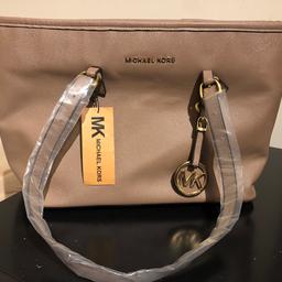 Brand New never used Michel Kors Hand Bag.