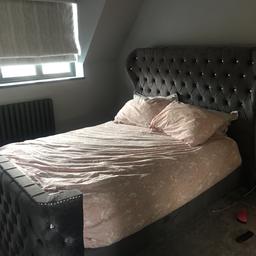Only six months old double bed frame with wooden slats, it’s absolutely beautiful comes with diamonds in a grey velvet,It’s from luxury bed company only selling as I need an Ottoman,has one broken slat