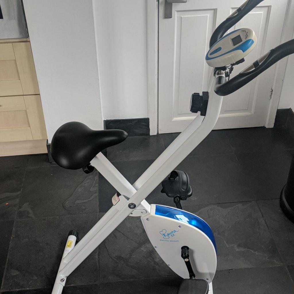 divina McCall exercise bike good condition one strap missing