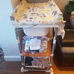 Baby unit - changing table with bath. Really good as you dont need to bend during bathing. It has some shelf you can store the baby stuff. There is small hole on the mat, but it does not affect the usage. In good condtion. Must have item.