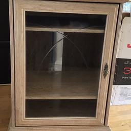 Limed oak glass cupboard, lid opens, door opens, open space in back for wires if you put stereo system in. Very good condition. Collect from Downham Bromley. 55cm wide, 80 cm tall
