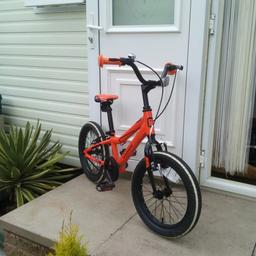 Cuda bloc child's bike in Orange, 16" wheels x 9" frame. as new condition, bargain "