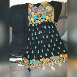 Georgous asian size small Black embroidered dress with multicoloured pompoms on sleeves and neck, comes with a dupatta, can be worn with leggings or any black trousers.