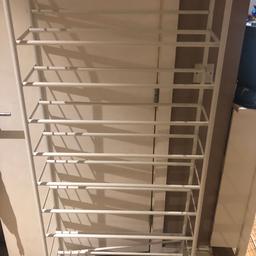 I have a 20 Tier shoe unit in white which can fit 40 pairs of shoes on. It was purchased from Argos. There is one bolt missing but does not affect the use. It is fully assembled.
