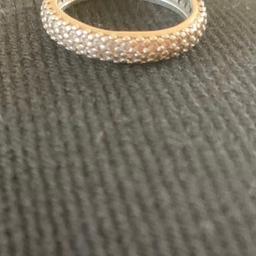 Lovely genuine pandora ring. Size 52. Recently brought but slightly too small for me. No stones missing and hallmarks shown. Can post at buyers cost.