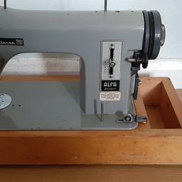 An old sewing machine we had for ages. It's fully workings comes with the power cord.