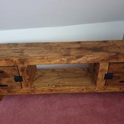 Rustic pine
very solid, heavy piece of furniture
