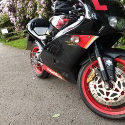 Here I have my Aprilia RS125 on a 54 plate. This bike is my pride and joy it is damn near mint for its age. Has a full arrow exhaust system. 5400 miles from new. Runs and rides amazing very fast for a 125. has marks on the left side from dropping it in my back yard.