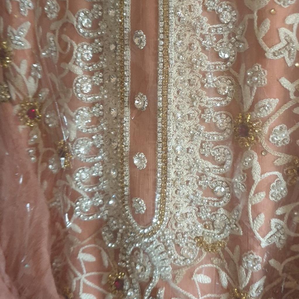 beautiful readymade suit with flary arms only wore 2 hours selling for £40 for all occasions weddings ...parties message me if interested original price £100 size 10 thanks x
