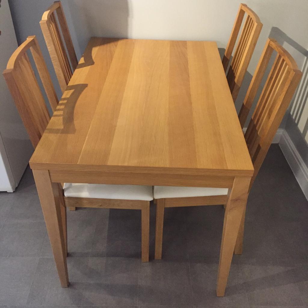 Oak veneer dining table and four chairs in NG6 Nottingham for £60.00
