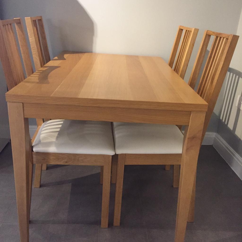 Oak veneer dining table and four chairs in NG6 Nottingham for £60.00