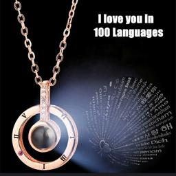 Color: rose gold, silver
3 different style: round,heart and double heart
Size:Extension chain: 10cm or less 
Perimeter:21cm (inclusive) -50cm (inclusive) 
How to use? 
1.Projected on the wall by flashlight, and you will see that I love you in 100 languages.
 2.Using a mobile camera can also see I love you in 100 languages.
Package Includes:
1x Necklace
