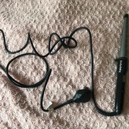 Babyliss curling wand. Works perfectly. £8.