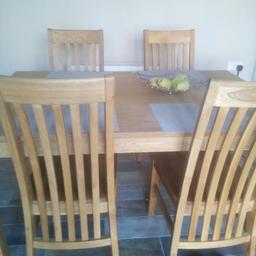 Oiled Oak dinning table and 4chairs excellent condition reduced no offers thanks