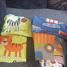 boys bed sheets. animal jungle and builders. barely used. for cot bed.