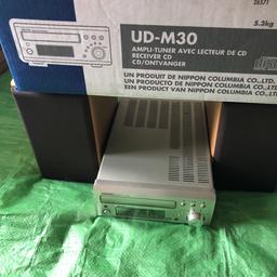 Denon UDM 30 silver midi system 
Working with remote control
Tuner and CD player with built in amp
20 to 50 watts per channel
