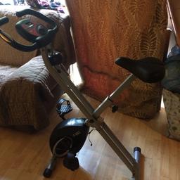 Collapsible home trainer fitness bike with 8 resistance levels, developed by F-bike Ultrasport indoor cycling with fitness and cardio device for strengthening your circulatory system. In excellent condition.