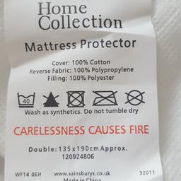 Double size 135x190 cm approx. Mattress Protector with straps - bought the wrong size and had already thrown the packaging away !!