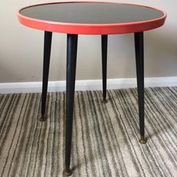 Great small retro table

Black with a orange edge

Detachable Wooden legs

Brass movable feet

Great small size which will fit anywhere
Or unscrew the legs and store it away

Table top 44cm
Height 48cm

Could use for camping, caravans or camper vans.