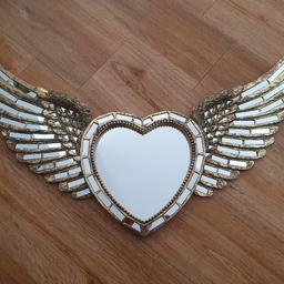 gold heart shaped mirro with angel wings