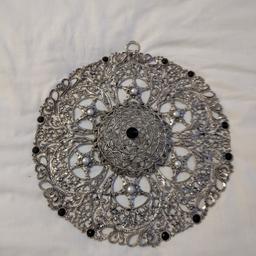 This is a beautiful wall ornament piece all the way from Egypt, it's heavy metal work, 25 cm all round.

cash only and meeting in public.