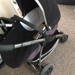 Comes with a purple flavour pack (as seen) and a brand new never opened black flavour pack. Comes with carrycot and seat - can be used forward or rear facing. Also comes with raincover, sunshade and umbrella.
