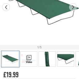 fold away green camp bed in a carry bag. images from argos