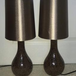 Two Next lamps with crackled glass effect. Used but very good condition. From a smoke free home. Golden brown tan colour £10 for both
