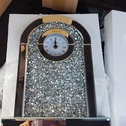 new in box lovely mirrored crushed diamond mantle clock...this clock has some Browning at the bottom as  shown in pic .
collection Waterlooville .