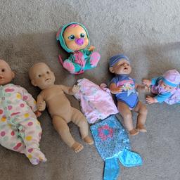 5 dolls including baby born baby annabell, cry baby, crawling baby. used condition