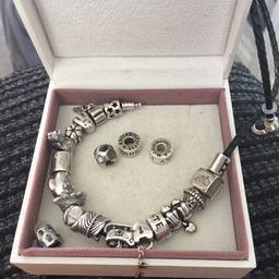 Genuine charms all silver want gone to a good home selling £5.00 a charm (except the ones sigh stones they are 10 each) leather bracelet is £15 please message for any questions