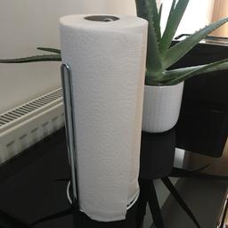 From Ikea, simple and sleek design
Can be screwed on to surface (holes shown in 3rd picture)

*Kitchen roll not included :)