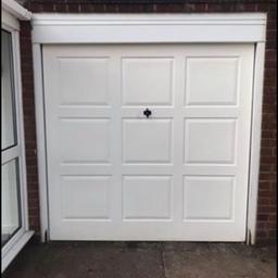 Up and over garage door in fully working order. 
7ftx7ft
Fibre glass