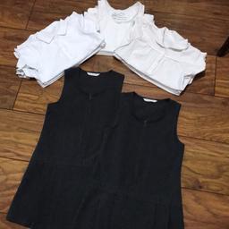 2 pinafores M&S 
4 polo shirts with beautiful detail on the sleeves and across the chest M&S
3 plain polo shirts Lidl 
4 plain vests Lidl 

Excellent condition 

Collection only Euxton