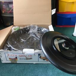 This is an electric, large pizza pan in good condition. It has only been used once and is still with the box in good working order