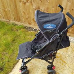 clean light weight foldable stroller easy to push in excellent condition. with universal rain cover