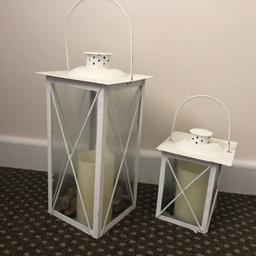 shabby chic Lanterns just needs a clean as been in storage. With candles and pebbles. Candles need new batteries.