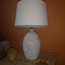 Two lamps for sale.

Heavy base grey with white lace detail. Shade off white.

Will sell separate.