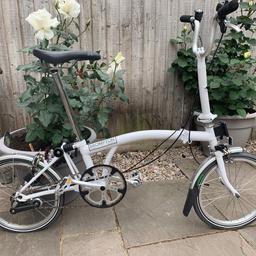 As new Brompton bike for sale. Wheeled carry case included. Also includes pannier bag which locks securely to the front of the frame