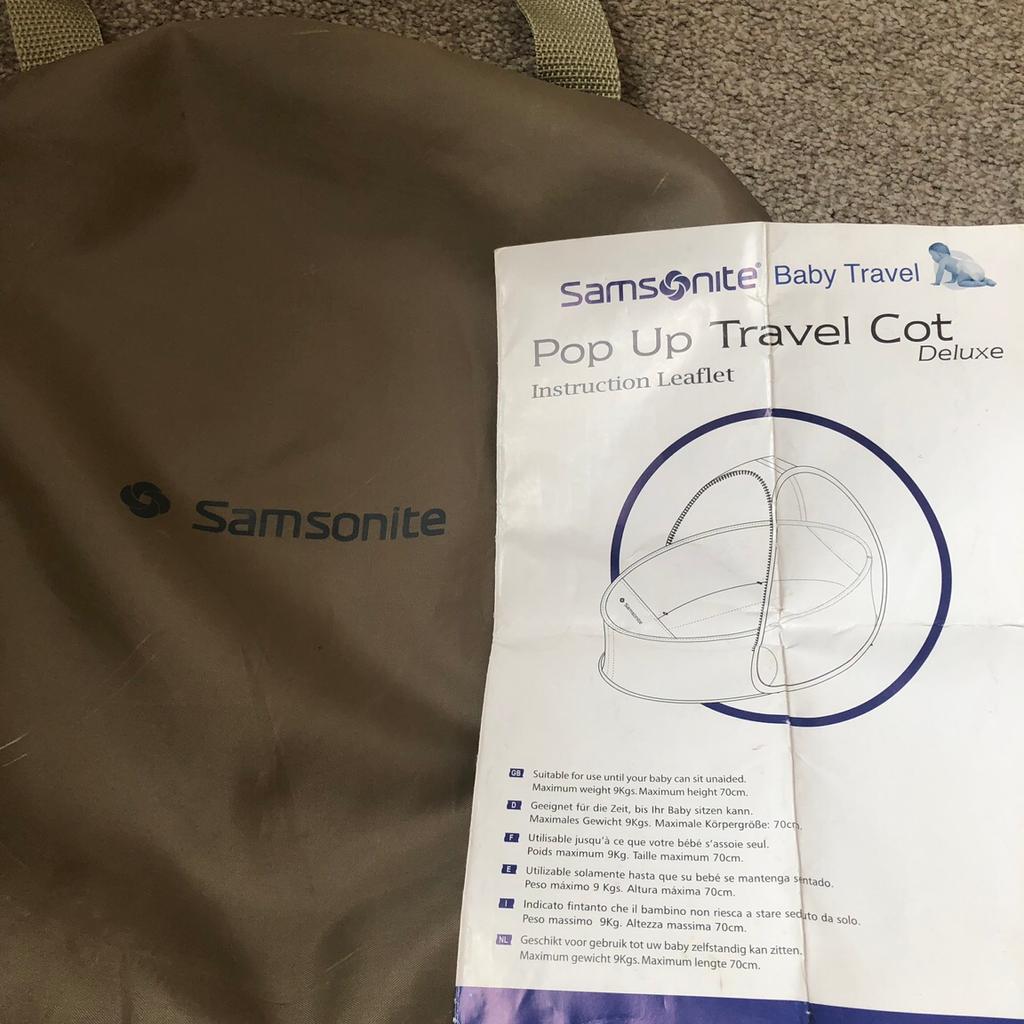 Samsonite pop up travel hotsell cot deluxe