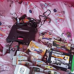 Nintendo 64 with 14 game n a controller 4 games in boxes 3 of boxedgames have manuals I payed 60 for just them 3 games a few year ago so u get it for a bargain 👍

good condition