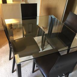 £375.99 brand new in Jan 2018.

Beautiful table and we are devastated to be selling - but we are moving! Perfect table and 4 chairs in sturdy strength condition.
there is a few usage marks on the chairs where they have been against the edge of the glass table - can’t do much about them but could definitely be polished out!

Collection only and can be flattened with some notice - could probably manoeuvre out in one piece
Open to offers for quick collection!
MUST GO