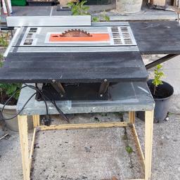 10" blade electric table saw. good working order. extension side and end tables. metal frame stand included.