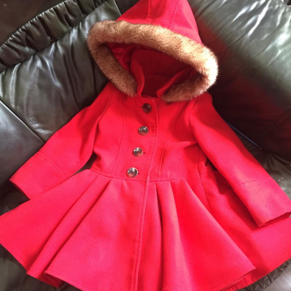 Mothercare store red coat