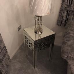 Two mirrored side table and lamps like new don’t have long one has small crack on corner can’t really notice getting baby started walking !