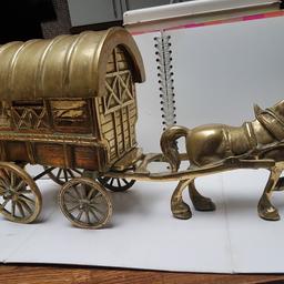 Brass Horse and Gypsy Romany Caravan. Large and heavy. Approx 14kg.


The horse is attached to the caravan with 2 brass screws, but will be separated for posting


Measures approx 22 Inches /56cm long x 12 inches/ 28cm high (max) x 6 inches / 15cm wide (max ).


Lid of the caravan comes off providing a secret storage compartment.