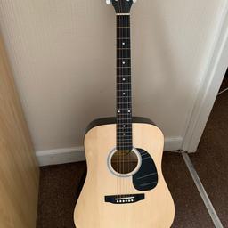 Full size Squier Fender Dreadnought SA-105 6 string acoustic guitar. It’s in good condition as it was rarely used.

Comes with guitar bag, strap and stand.
