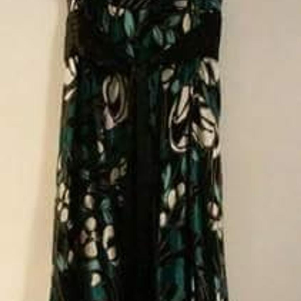 Monsoon dress size 14 willing to post for an extra fee
(b23)